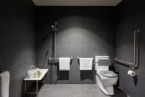 A modern bathroom with a toilet, bidet, and shower. - Punthill Caroline Springs (Caroline Springs)