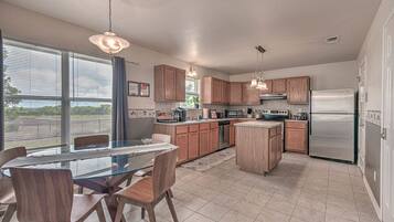 Microwave, dishwasher, coffee/tea maker, cookware/dishes/utensils