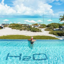 Outdoor pool, an infinity pool, pool loungers