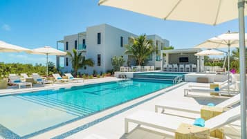 Outdoor pool, an infinity pool, pool loungers