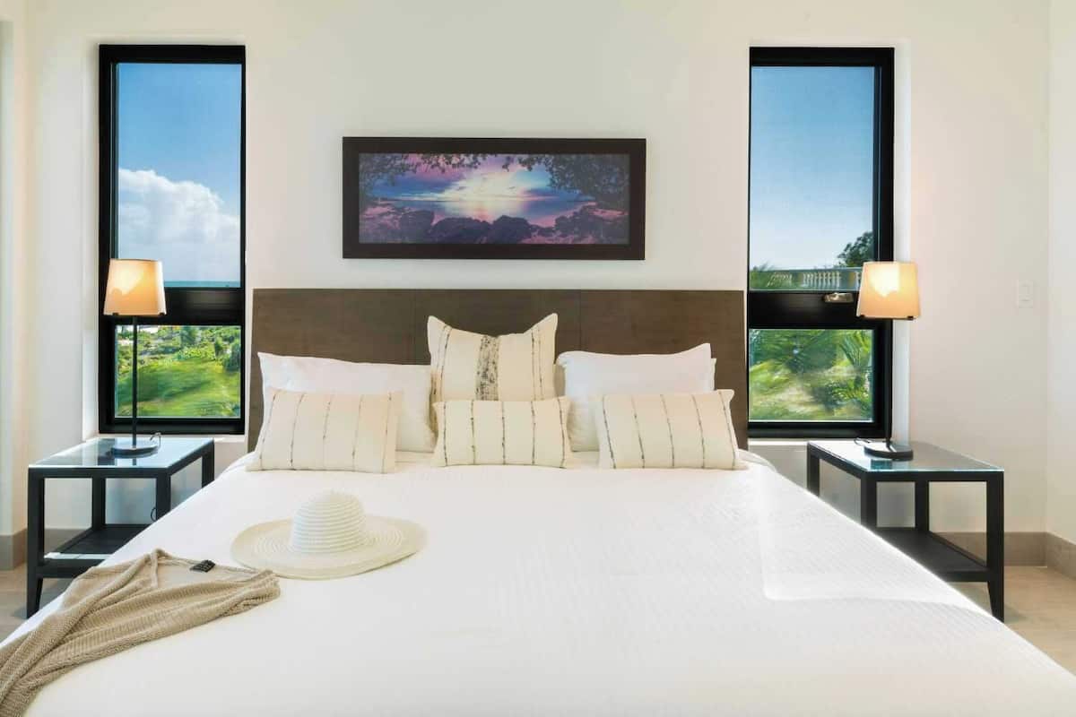 Deluxe Studio, Garden View, Garden Area | 3 bedrooms, minibar, in-room safe, blackout curtains