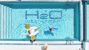 Outdoor pool, an infinity pool, pool loungers