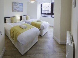 2 dormitorios, tabla de planchar con plancha, wifi gratis