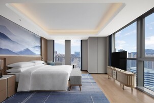 Deluxe Suite, 1 King Bed | Minibar, in-room safe, desk, iron/ironing board