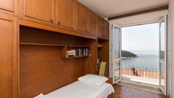 Apartment (1Bedroom Suite,Balcony, Sea view) | 2 bedrooms, free WiFi, bed sheets
