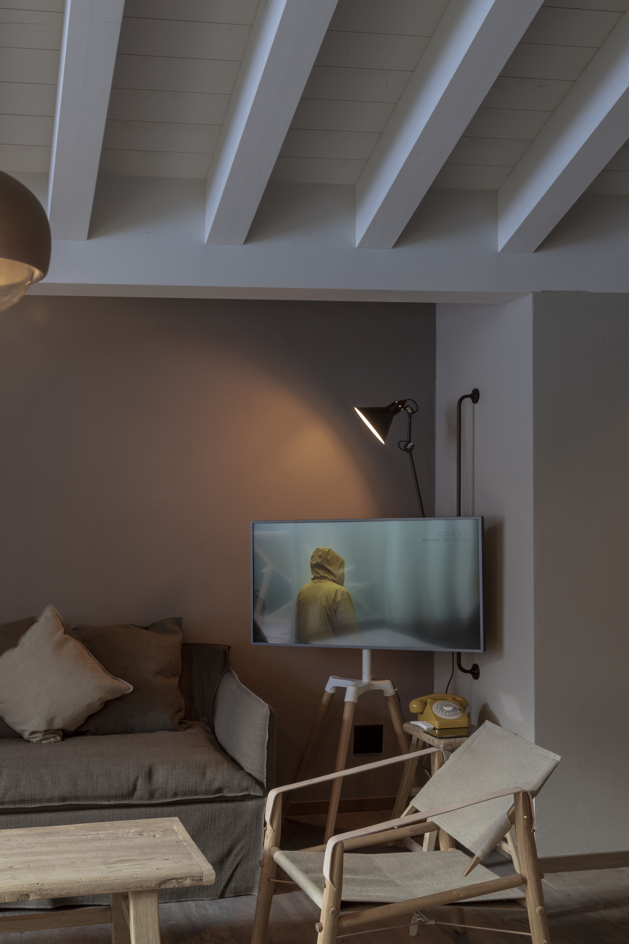 nomad roof suite | living area | tablet, heated floors