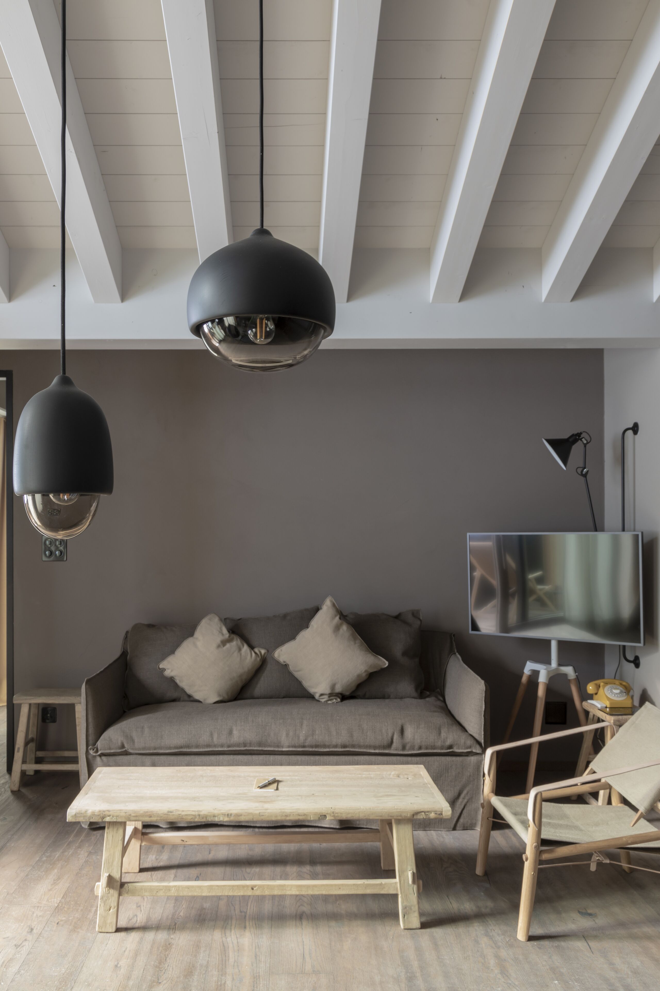 nomad roof suite | living area | tablet, heated floors