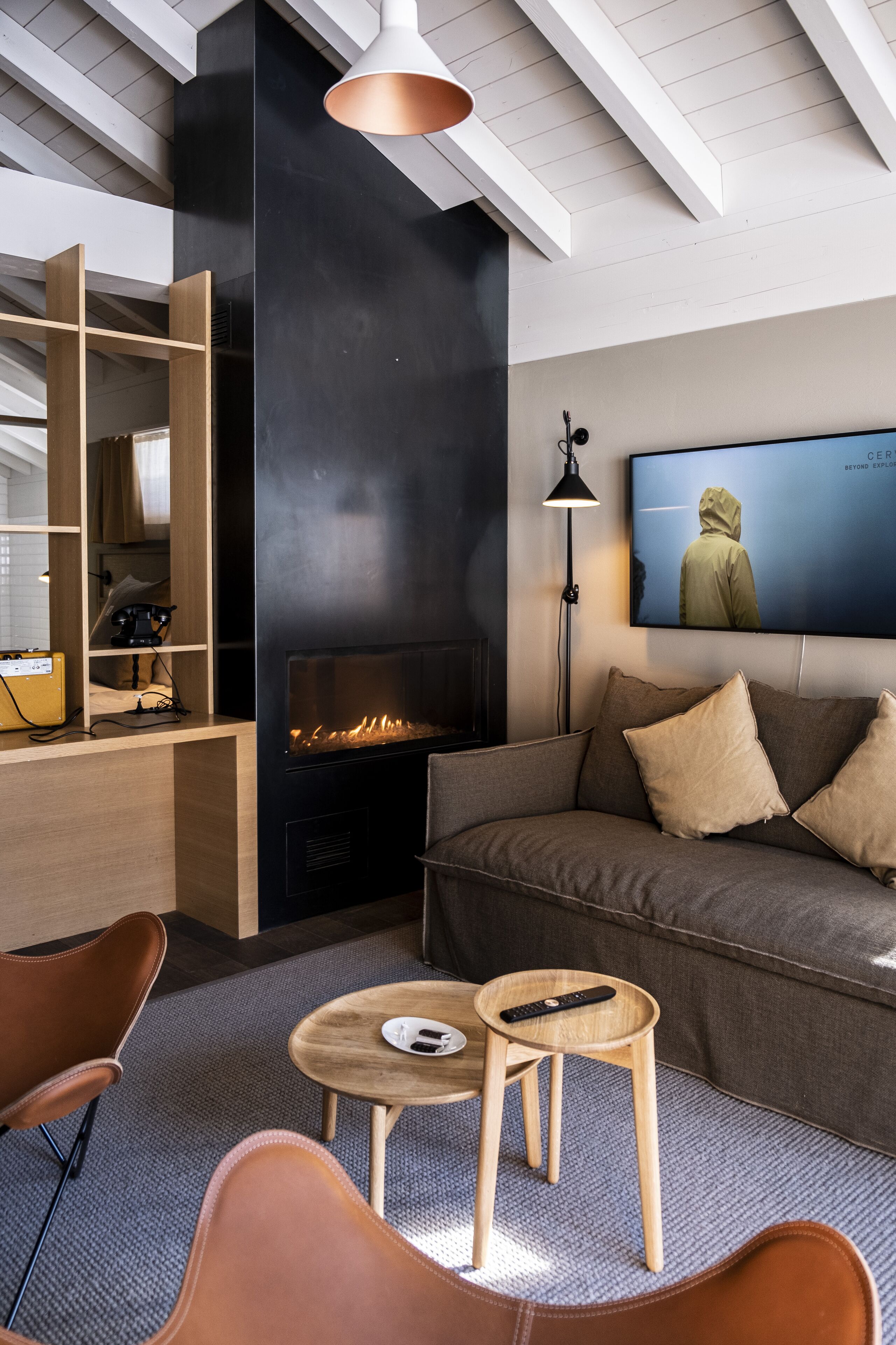 nomad roof junior suite | living area | tablet, heated floors