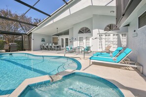 A heated pool, pool loungers - Villa Treasure Island - Beautifully Renovated Private Pool Home w/ Hottub (Bradenton)