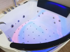 Shower, jetted tub, hair dryer, bidet