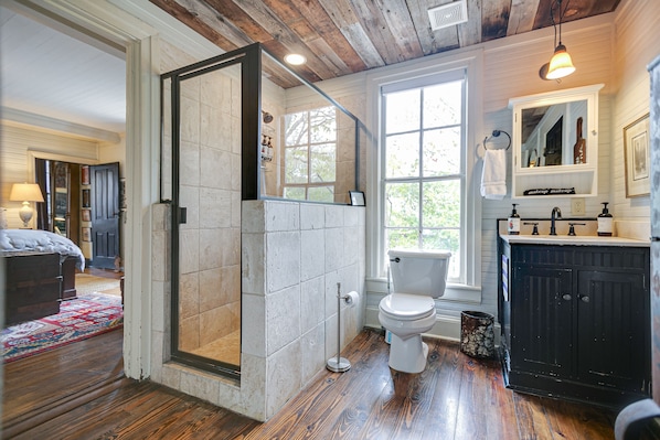Bathtub, towels, soap, toilet paper
