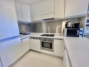 Appartement (0 Bedroom) | Privékeuken | Een vaatwasser