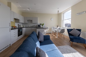 Apartamento urbano | Área de estar | TV de tela plana
