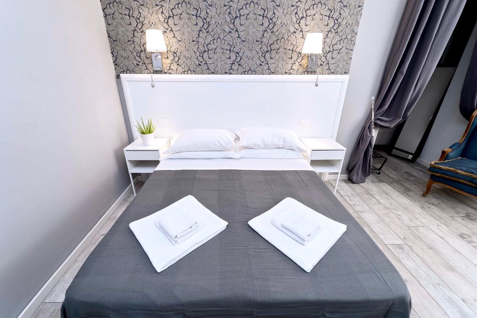 1 bedroom, desk, iron/ironing board, travel crib