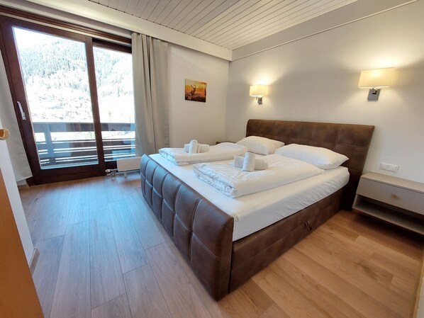 2 bedrooms, in-room safe, iron/ironing board, travel cot