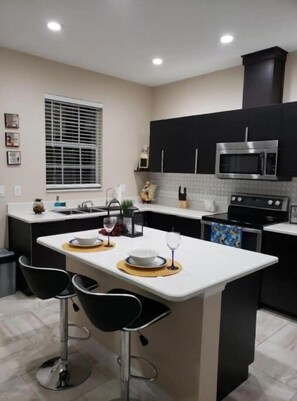 Fridge, microwave, oven, coffee/tea maker