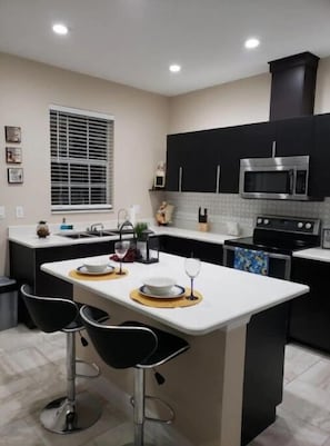 Fridge, microwave, oven, coffee/tea maker