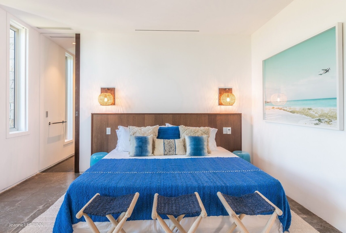 Elegant bedroom suite with terrace access
