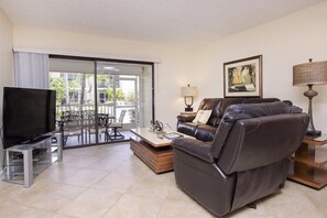 Condo (Villa Sanibel 2B) | Living room | Flat-screen TV