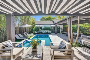 Outdoor pool, a heated pool - Downtown Luxury Home + Guest Home w/ Heated Pool & Spa 3 blocks to Atlantic Ave (Delray Beach)