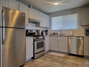 Fridge, microwave, oven, stovetop - Spacious newly remodeled 3br 2ba in heart of the Seattle (Seattle)