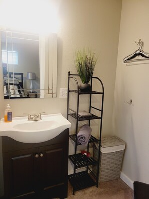 Combined shower/tub, hair dryer, towels, soap