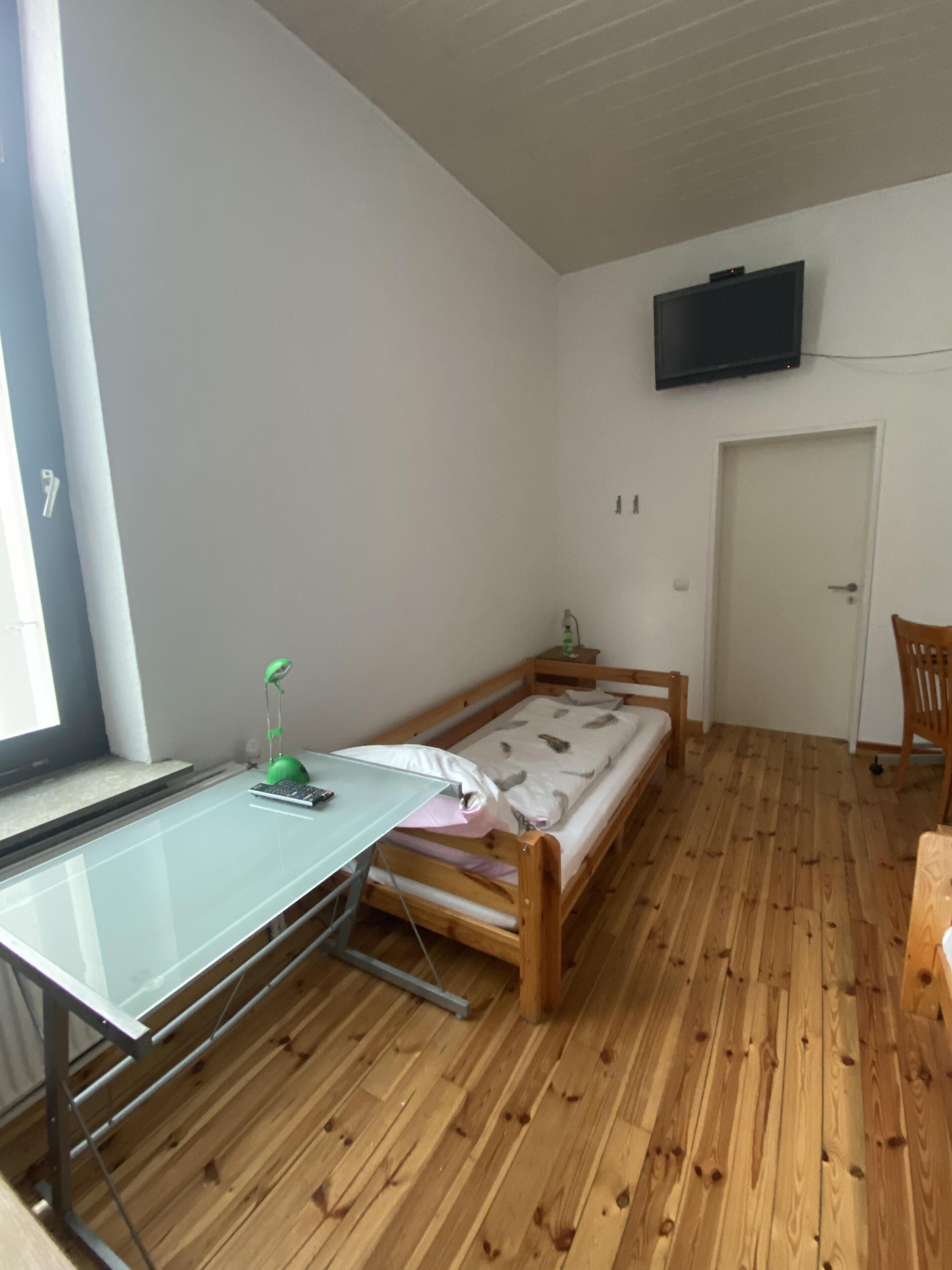 Economy-Doppel- oder -Zweibettzimmer, Gemeinschaftsbad | 1 Schlafzimmer