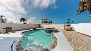 Outdoor pool, a heated pool - Oceanview 3-bdrm home steps from beach!  Heated pool & hot tub. Sleeps 8. (Fort Myers Beach)