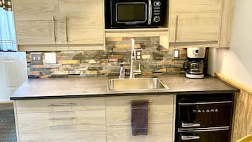 Fridge, microwave, coffee/tea maker, toaster