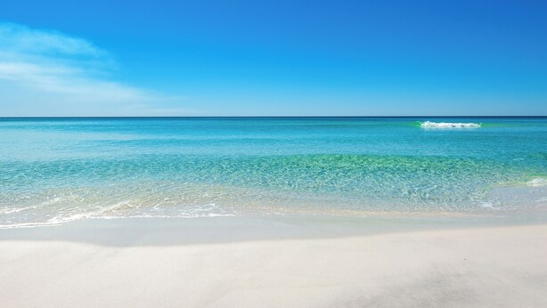 A beach with clear turquoise water and white sand. - Gulf Front, Gorgeous Views, Top Floor, Pool, Gated Complex, 30A (Santa Rosa Beach)