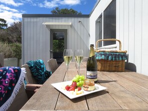 Outdoor dining - Dolphin Shores - A very private beachfront oasis with separate games room. (Dolphin Sands)