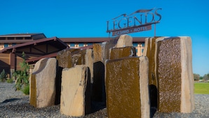 A stone structure with a sign that reads "LEGENDS CASINO HOTEL" in the background. - Legends Casino Hotel (Toppenish)