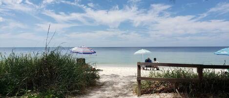 On the beach, sun-loungers, beach towels