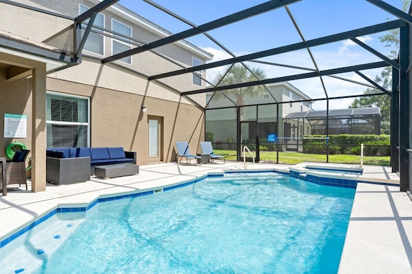 A heated pool, sun loungers