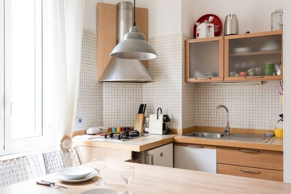 Fridge, stovetop, electric kettle, toaster