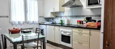 Fridge, microwave, oven, stovetop