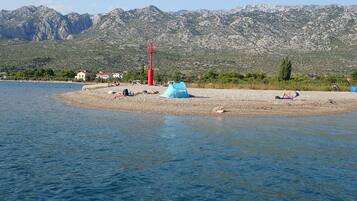Beach nearby, sun loungers