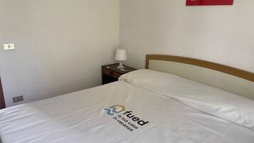 2 habitaciones y ropa de cama