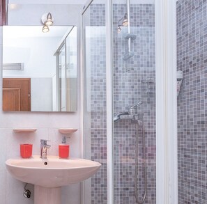Combined shower/tub, jetted tub, hair dryer, bidet
