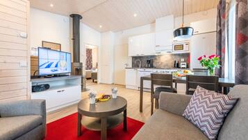 Cottage, 2 Bedrooms, Sauna | Living room | 42-inch Smart TV with digital channels, TV, DVD player