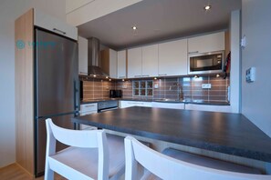 Appartement, 4 chambres (128m2) | Cuisine privée