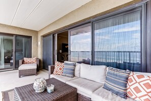 Living area - Oceanfront Condo with Oceanside Pool and Private Fishing Pier Access by RedAwning (Fernandina Beach)