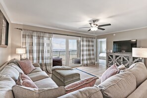 Living area - Oceanfront Condo with Oceanside Pool and Private Fishing Pier Access by RedAwning (Fernandina Beach)