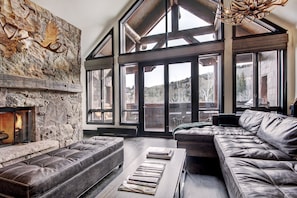 Condo, 4 Bedrooms | Living area | Flat-screen TV