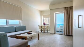 Luxury Duplex, Sea View | Living area | 32-inch flat-screen TV with satellite channels, TV