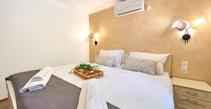 2 habitaciones, tabla de planchar con plancha, wifi y ropa de cama 