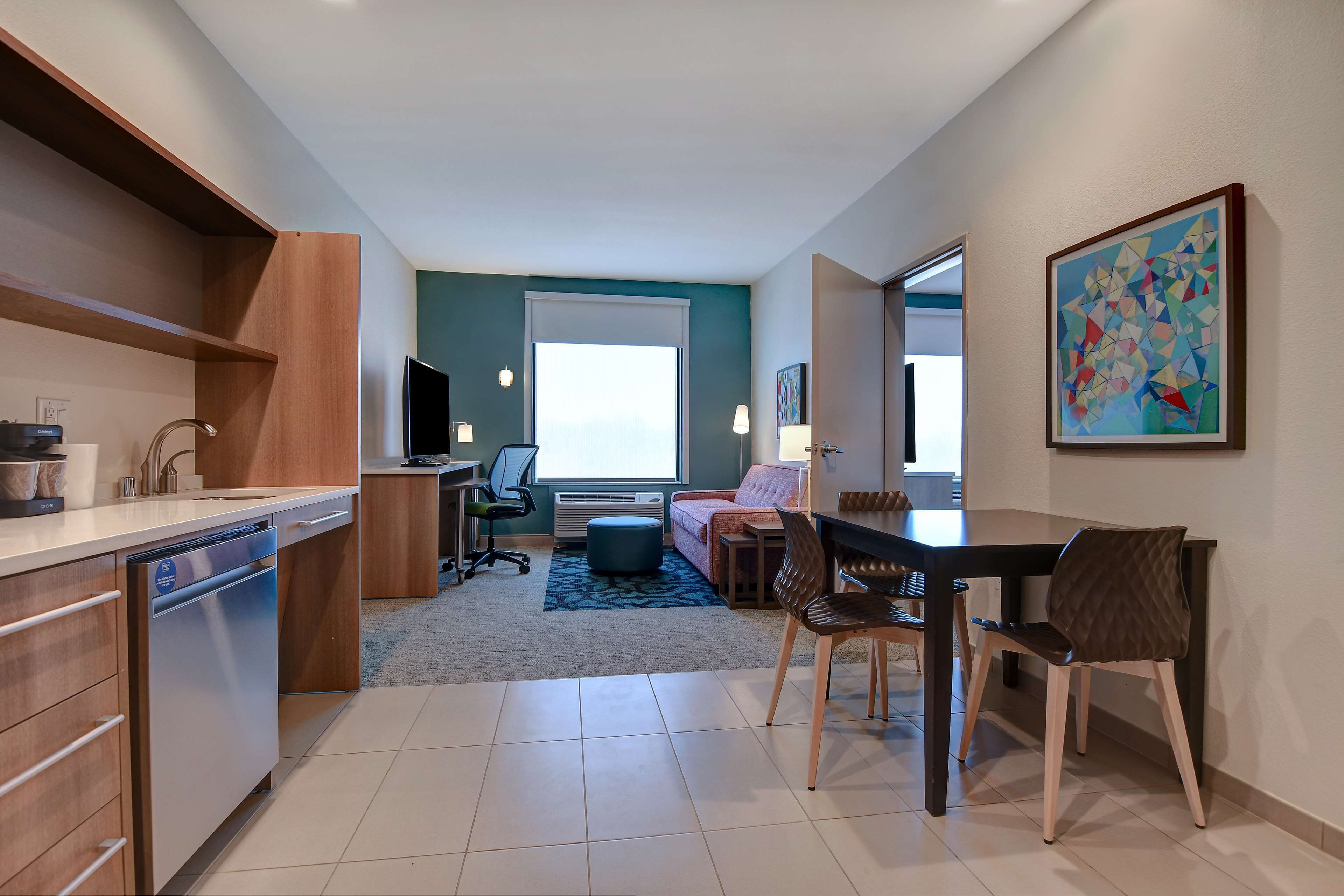 full-sized fridge, microwave, dishwasher, coffee/tea maker