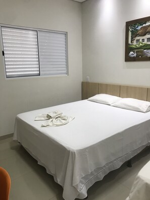 Habitación Confort | Minibar, escritorio, wifi gratis y ropa de cama