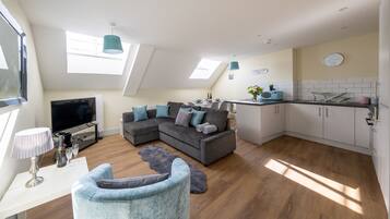 City Apartment | Living area | Flat-screen TV