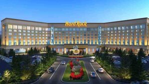 A large hotel with a central atrium, multiple floors, and a parking lot. - MtnMusicLoft,Find Your Rhythm in Heart of Downtown (Bristol)
